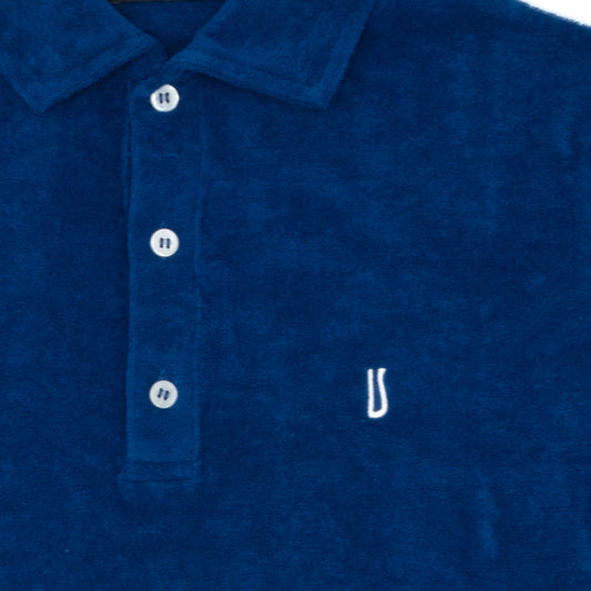 Blue terry polo shirt with white Ulturale logo